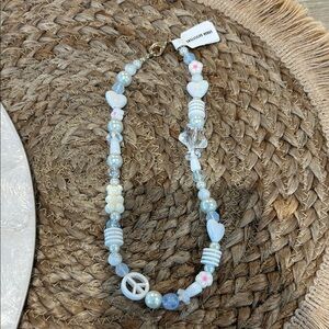 Urban Outfitters Light Blue Heart and Peace Necklace